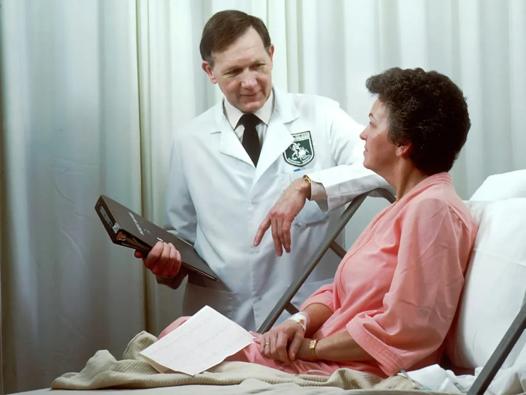 Clinician talking with an older patient about mobility